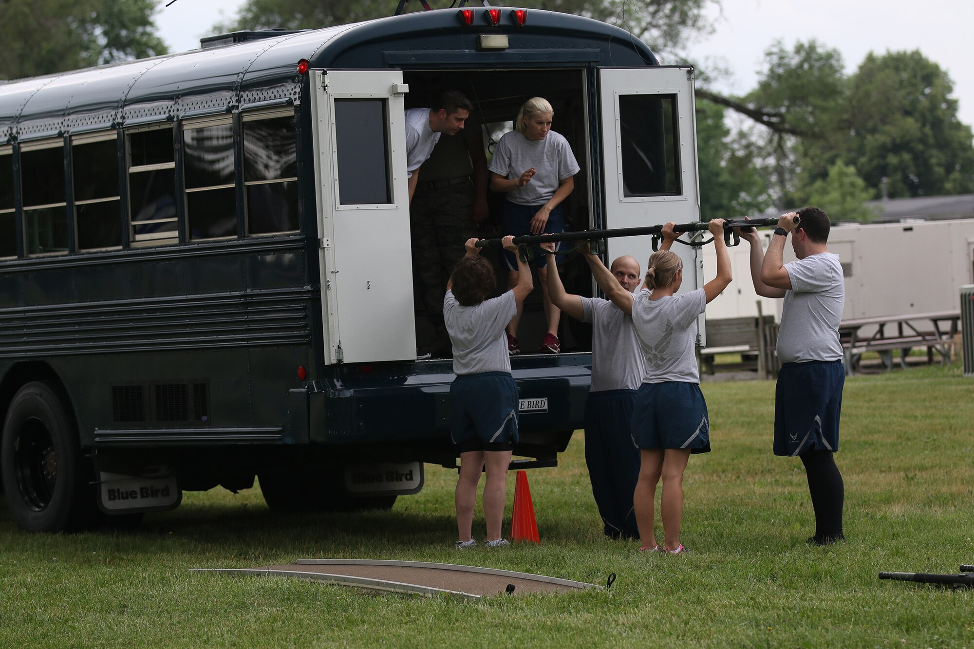 Members of the 445th Aerospace Medicine Squadron take part in a team building exercise here June 6, 2018.  Members trained on weapons handling, patient transport, battlefield triage, and stretcher maneuvers.