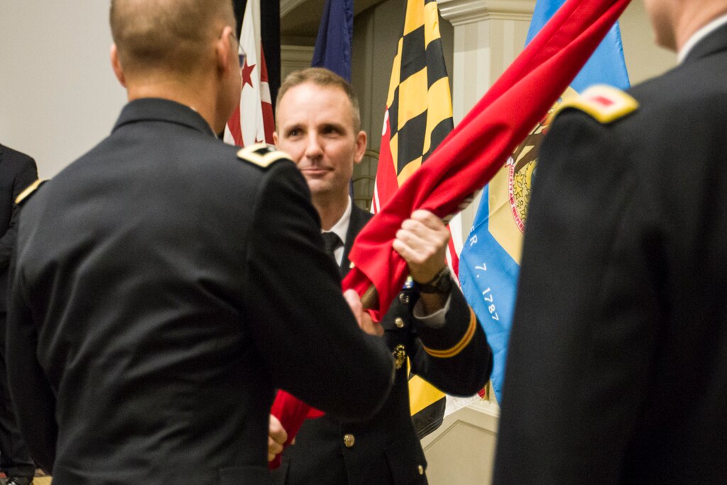 Col. John T. Litz accepts the organizational colors, symbolizing the taking of responsibility for the U.S. Army Corps of Engineers, Baltimore District, from Maj. Gen. William H. Graham, commander of the U.S. Army Corps of Engineers, North Atlantic Division, during a traditional change of command ceremony in downtown Baltimore Friday morning July 13, 2018. Litz assumed command of Baltimore District from Col. Edward P. Chamberlayne, who is retiring after a 25-year career with the U.S. Army.