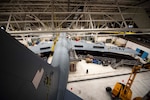 A KC-135 sits in the sustainment dock hangar while maintainers from the 141st and 92nd Maintenance Squadrons work during an isochronal inspection June 5, 2018, at Fairchild Air Force Base, Wash. Airmen from 11 different specialties complete the process of dismantling, inspecting, repairing and sometimes modifying the aircraft during the isochronal inspection.