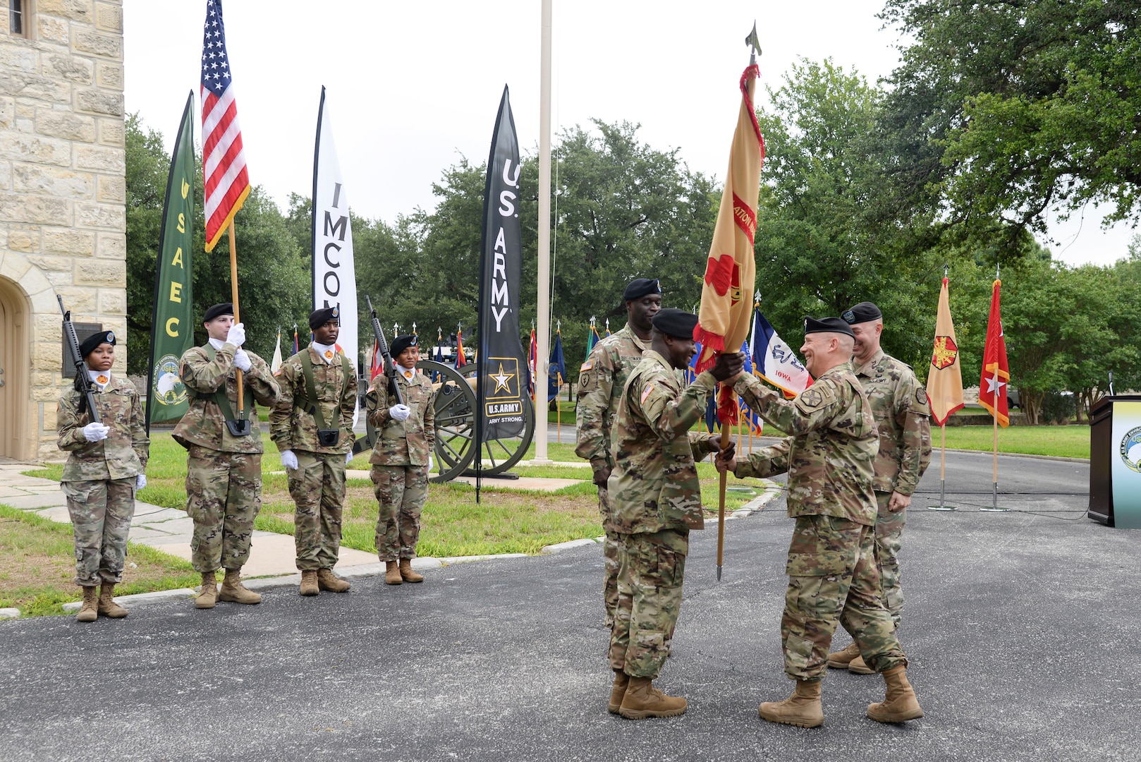 Col. Isaac Manigault accepts the colors of the U.S. Army Environmental Command during a change of command ceremony at the U.S. Army North Quadrangle at Joint Base San Antonio-Fort Sam Houston July 11. Manigault took command of the USAEC from Col. Timothy Greenhaw, who led the command for two years. Greenhaw is heading to the Pentagon to work at the Joint Staff J-8 Joint Requirements Office.