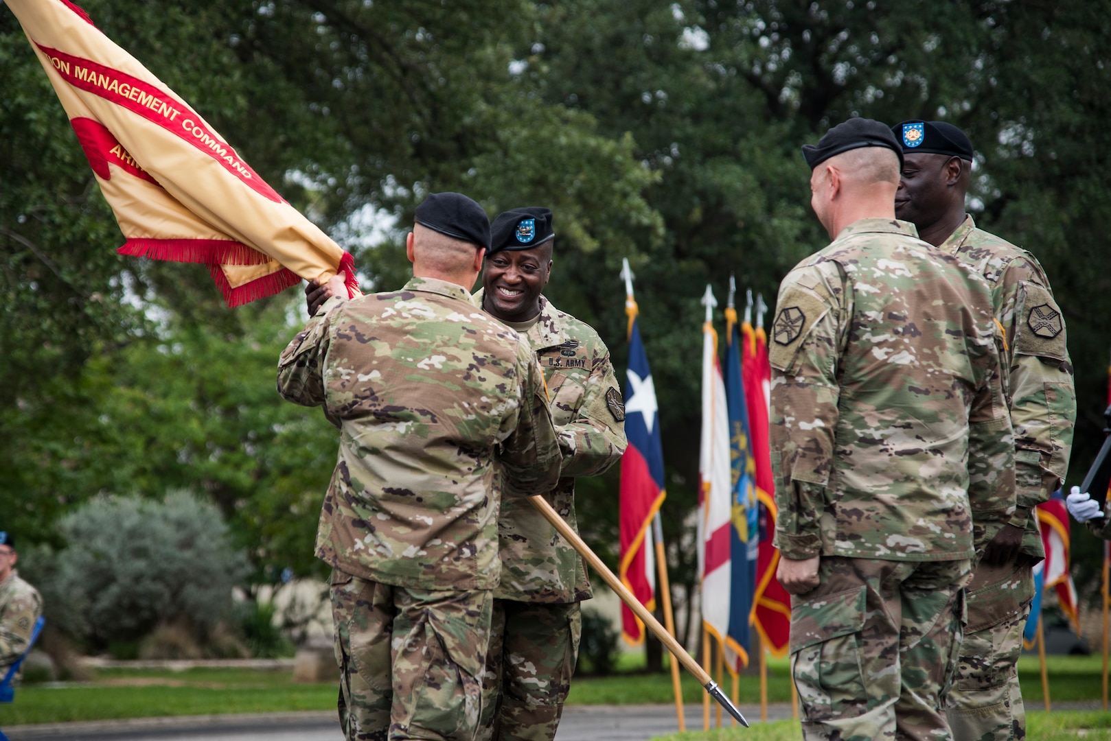 Col. Isaac Manigault accepts the colors for the U.S. Army Environmental Command during a change of command ceremony at the U.S. Army North Quadrangle at Joint Base San Antonio-Fort Sam Houston July 11. Manigault took command of the USAEC from Col. Timothy Greenhaw, who led the command for two years. Greenhaw is heading to the Pentagon to work at the Joint Staff J-8 Joint Requirements Office.