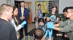 IMAGE: KING GEORGE. Va. (June 25, 2018) - Rep. Rob Wittman (R-Va.) observes middle school students engage in one of ten science, technology, engineering and mathematics (STEM) activities at the 2018 STEM Summer Academy sponsored by Naval Surface Warfare Center Dahlgren Division. Students briefed their mentors, teachers, and visitors, including Wittman, on how they overcame a variety of Navy focused problems with STEM, creativity, communication, and teamwork throughout the week-long academy