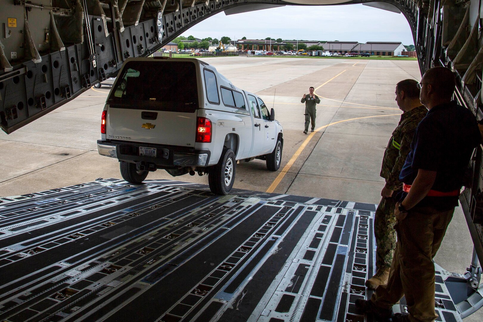Members of Joint Task Force Civil Support (JTF-CS) and airmen from Langley Air Force Base load vehicles onto a Boeing C-17 Globemaster III during a no-notice Deployment Readiness Exercise (DRE). The purpose of the DRE was to test both commands ability to rapidly deploy during an incident. When directed, JTF-CS is ready to respond in 24 hours to provide command and control of 5,200 federal military forces located at more than 36 locations throughout the nation acting in support of civil authority response operations to save lives, prevent further injury, and provide critical support to enable community recover. (Official DoD photo by Mass Communication Specialist 3rd Class Michael Redd/released)