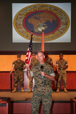 Lieutenant General Carl E. Mundy, III, the new commander of United States Marine Corps Forces, Central Command addresses the service members and attendees during the MARCENT change of command ceremony, at the Vince Tolbert Building at MacDill Air Force Base, July 11. Mundy assumed command from Lt. Gen. William D. Beydler, who has served as the MARCENT Commander since Oct. 27, 2015.