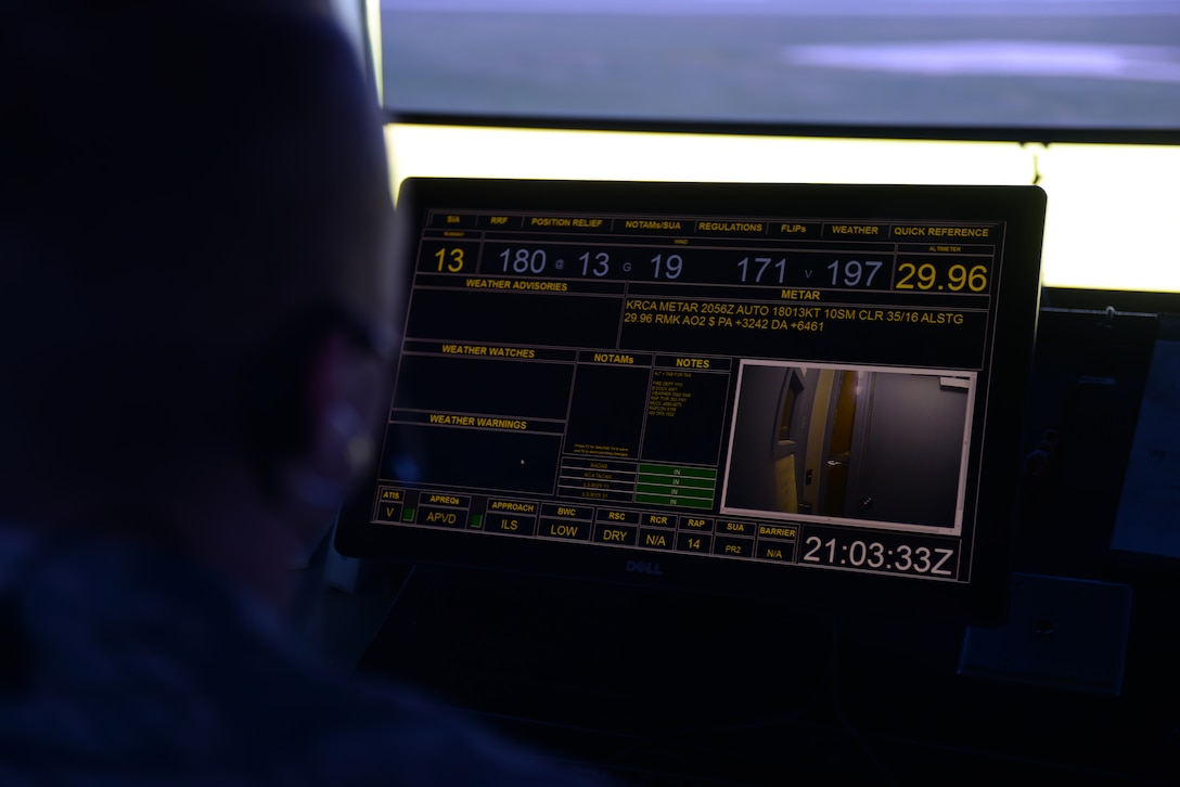 Senior Airman Joel Williams III, a 28th Operations Support Squadron air traffic control journeyman, monitors at the entrance screen inside the air traffic control tower at Ellsworth Air Force Base, S.D., July 10, 2018. Air traffic controllers at Ellsworth AFB work two different shifts at the tower: one morning shift and one swing shift in the afternoon. (U.S. Air Force photo by Airman 1st Class Nicolas Z. Erwin)