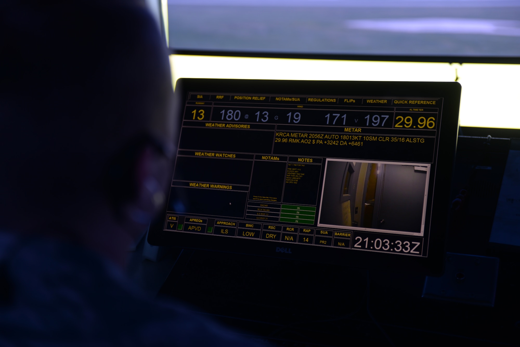 Senior Airman Joel Williams III, a 28th Operations Support Squadron air traffic control journeyman, monitors at the entrance screen inside the air traffic control tower at Ellsworth Air Force Base, S.D., July 10, 2018. Air traffic controllers at Ellsworth AFB work two different shifts at the tower: one morning shift and one swing shift in the afternoon. (U.S. Air Force photo by Airman 1st Class Nicolas Z. Erwin)