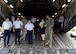 U.S. Air Force Capt. Warren Carter, Operations Element Chief, 18th Aeromedical Evacuation Squadron, Det 1, speaks with Koku Jieitai, Japan Air Self Defense Force, Maj. Gen. Shinya Bekku, Koku Jieitai Surgeon General, aboard a C-17 Globemaster III at Joint Base Pearl Harbor-Hickam, Hawaii, July 11, 2018.