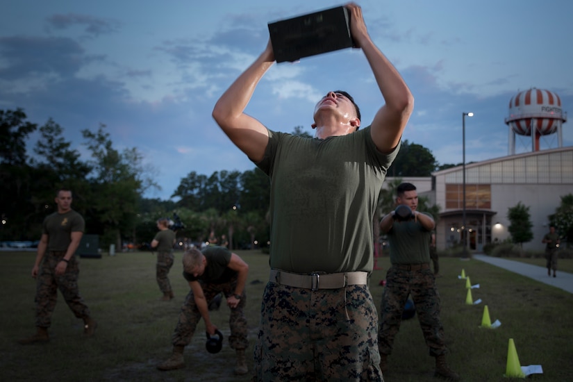Marines exercise during a High Intensity Tactical Training session led by Force Fitness instructor, Sgt. Jared Skelley, July 12 aboard Marine Corps Air Station Beaufort. Skelley specializes in creating workout routines for individual Marines focusing on functional planes of motion, combat readiness and injury prevention.