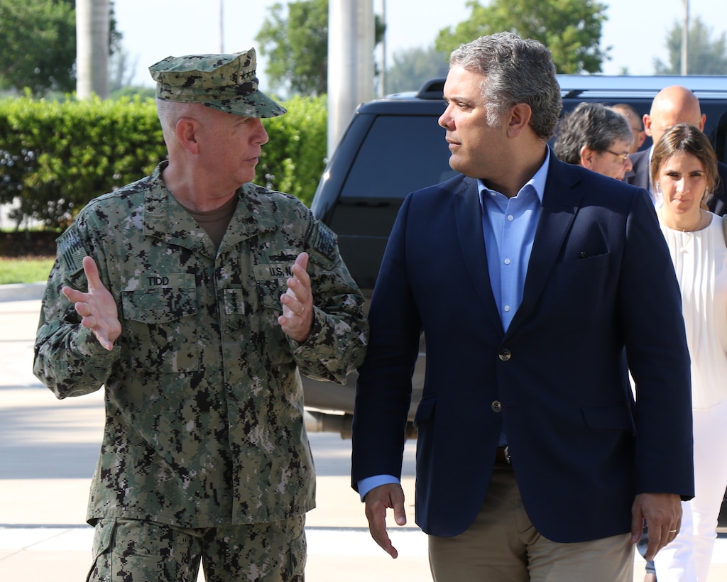 U.S. Navy Adm. Kurt Tidd, commander of U.S. Southern Command (SOUTHCOM), talks with Colombian President-elect Ivan Duque