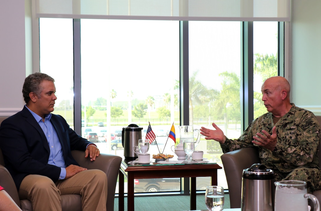U.S. Navy Adm. Kurt Tidd, commander of U.S. Southern Command (SOUTHCOM), talks with Colombian President-elect Ivan Duque