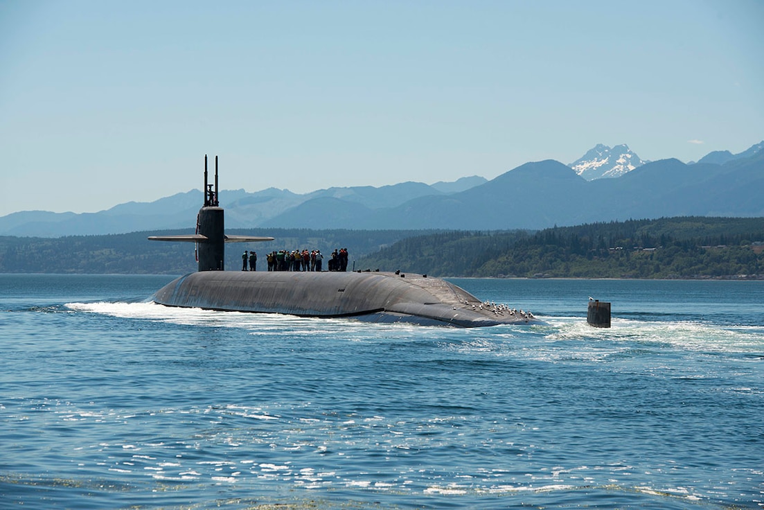 PUGET SOUND, Wash. (July 12, 2018) The Ohio-class ballistic missile submarine USS Nebraska (SSBN 739) transits the Hood Canal as it returns home Naval Base Kitsap-Bangor following the boat's first strategic patrol since 2013. Nebraska recently completed a 41-month engineered refueling overhaul, which will extend the life of the submarine for another 20 years. (U.S. Navy photo by Mass Communication Specialist 1st Class Amanda R. Gray/Released)