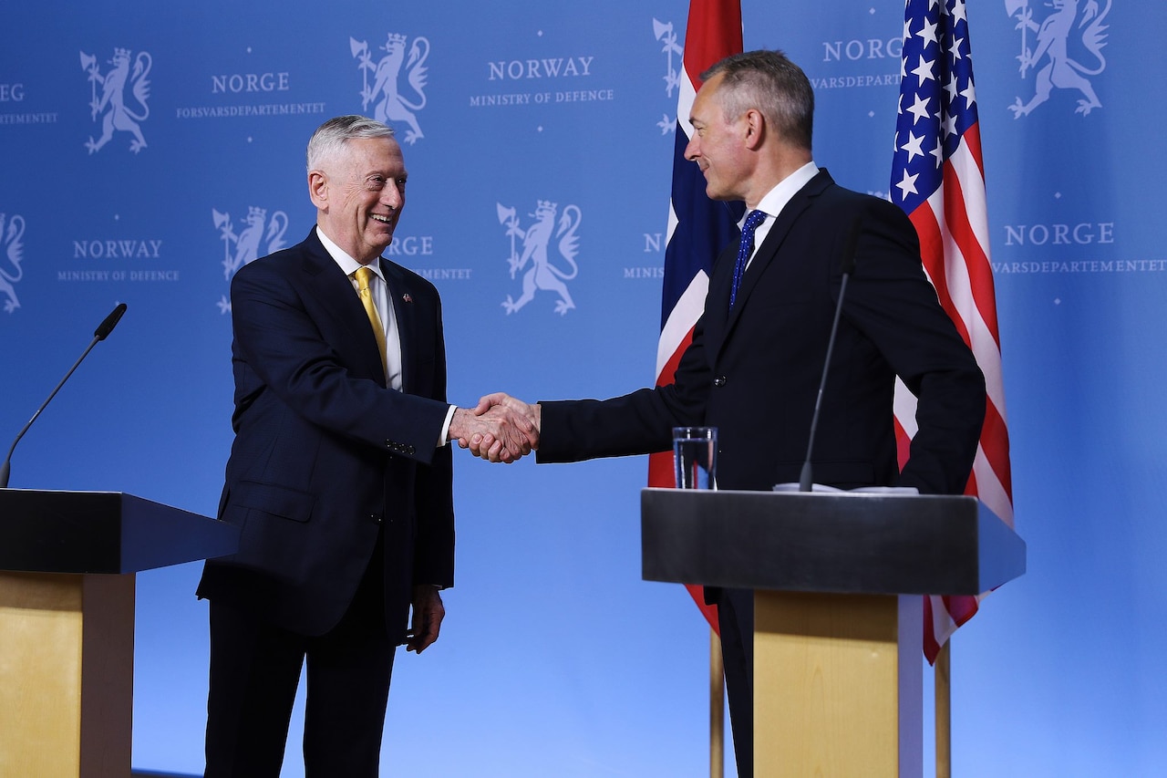 Defense Secretary James N. Mattis shakes hands with his Norwegian counterpart.