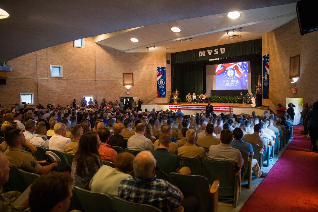 Loved ones, community members and distinguished visitors gather in the Mississippi Valley State University auditorium to honor the sacrifice of the fallen passengers and crew of Yanky 72, during the Memorial Ceremony, July 14, 2018. The Yanky 72 Memorial Ceremony was held to remember and honor the ultimate sacrifices made by the fallen Marines and Sailor of VMGR-452 and Marine Corps Special Operations Command. (U.S. Marine Corps photo by Lance Cpl. Samantha Schwoch/released)