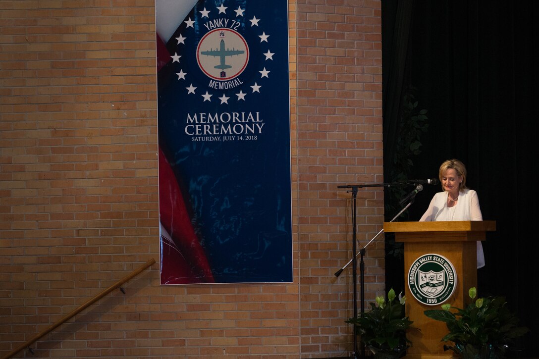 The Honorable Mrs. Cindy Hyde-Smith, U.S. Senator, State of Mississippi, speaks to the loved ones, community members and distinguished visitors who gather in the Mississippi Valley State University auditorium to honor the sacrifice of the fallen passengers and crew of Yanky 72, during the Memorial Ceremony, July 14, 2018. The Yanky 72 Memorial Ceremony was held to remember and honor the ultimate sacrifices made by the fallen Marines and Sailor of VMGR-452 and Marine Corps Special Operations Command. (U.S. Marine Corps photo by Lance Cpl. Samantha Schwoch/released)