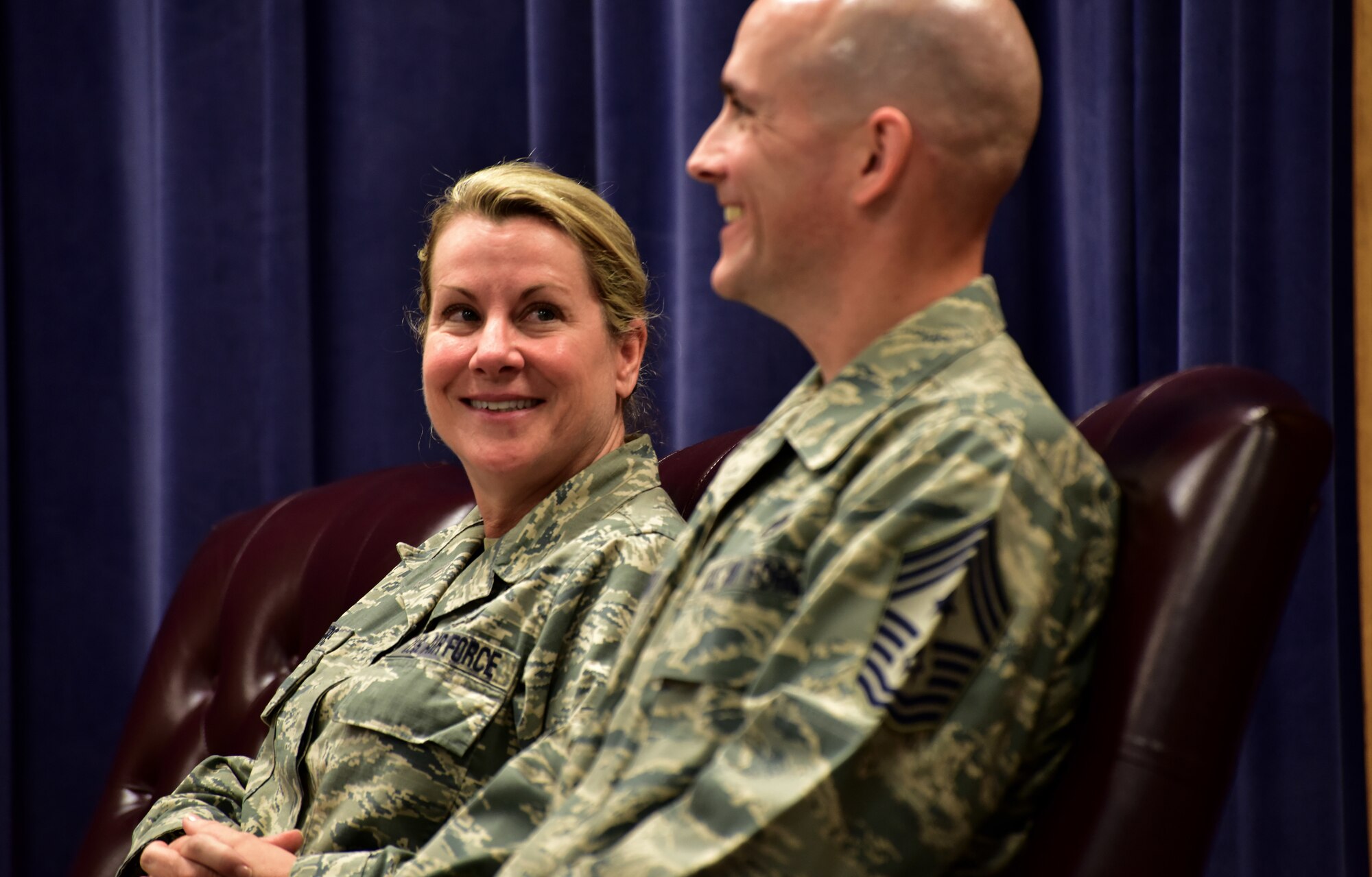 Outgoing 166th Airlift Wing Command Chief Master Sgt. Shaune Peters, left, looks on as her successor, Command Chief Master Sgt. William Horay, is introduced during their change of authority ceremony held at the New Castle ANG Base, Del. on July 14, 2018. (U.S. Air National Guard photo by Staff Sgt. Nathan Bright)