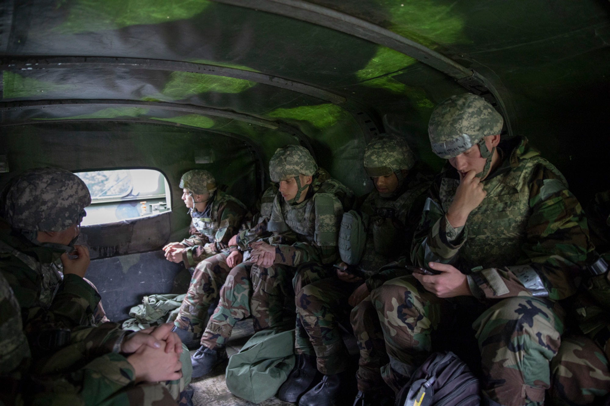 Yokota Airmen board a U.S. Marine Corps MK28 extended cargo truck