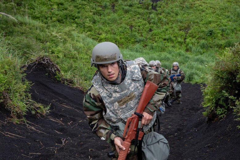 Airman 1st Class Aaron Yochim, 374th Maintenance Squadron aerospace ground equipment journeyman, performs individual team movement