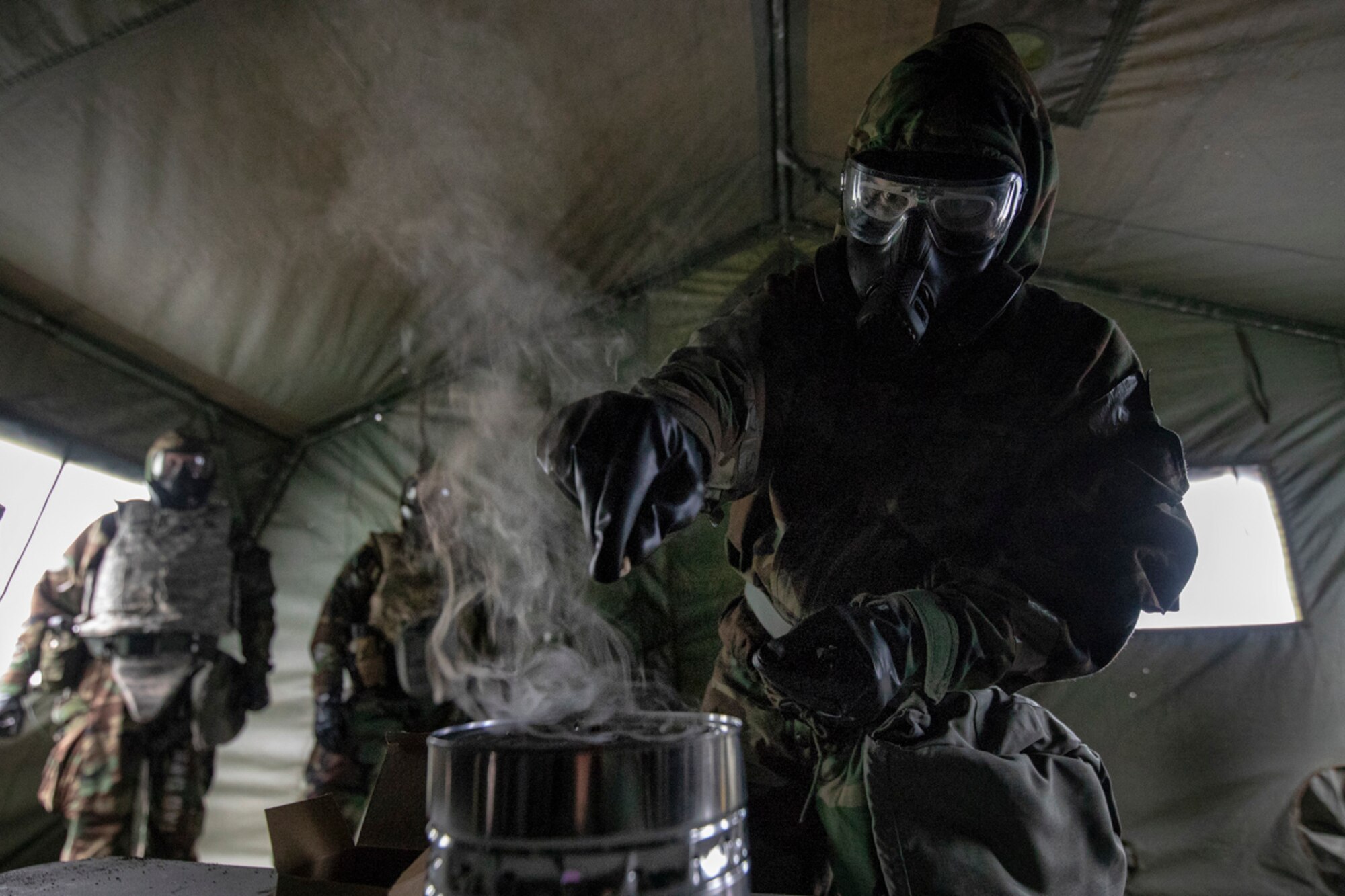 Senior Airman Ryan Hornyak, 374th Civil Engineer Squadron emergency management journeyman, breaks
