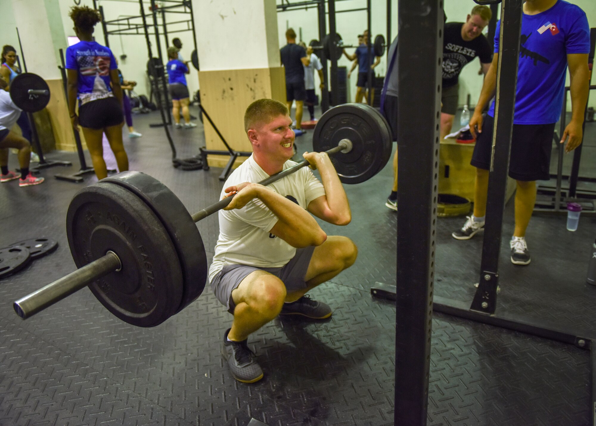 U.S. Air Force Staff Sgt. Brian Greilich does squats during a Crossfit session at Incirlik Air Base, Turkey, July 9, 2018.