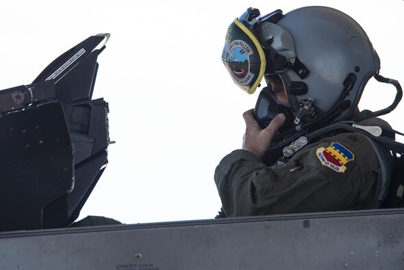 U.S. Air Force Maj. David Paulus, 77th Fighter Squadron (FS) assistant to the director of operations, adjusts his oxygen mask at Shaw Air Force Base, S.C., July, 9, 2018.