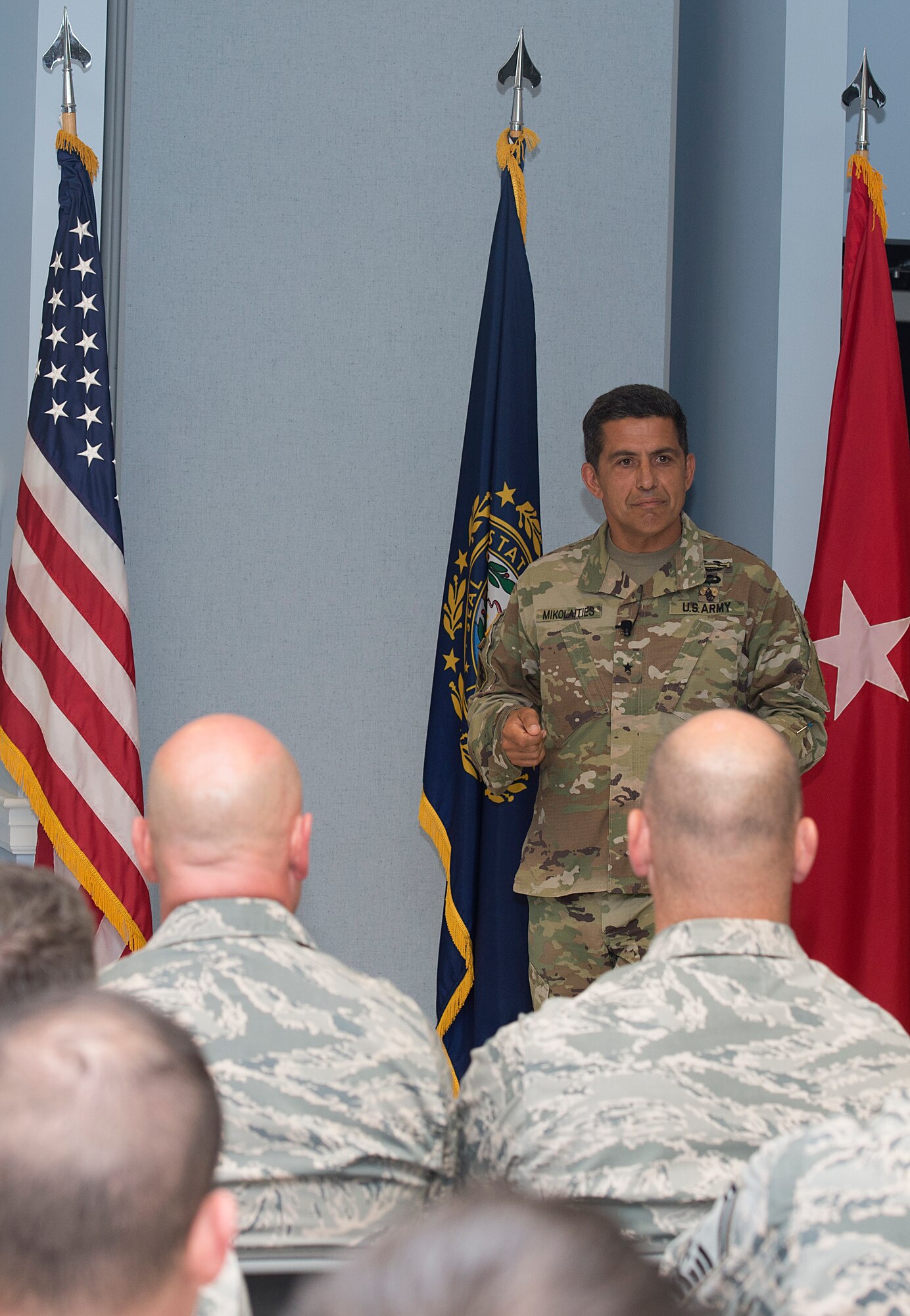 Brig. Gen. David Mikolaities, adjutant general of the New Hampshire National Guard, answers a question during a 157th Air Refueling Wing all call at Pease Air National Guard Base in Newington on July 12. Mikolaities praised the Wing for their operational readiness and high retention numbers. Photo by Staff Sgt. Kayla White, 157th ARW Public Affairs.