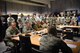 U.S. Airmen assigned to the 31st Communications Squadron, the 52nd Communications Squadron and the 603rd Air and Space Operations Center present mission statistics to distinguished visitors on Ramstein Air Base, Germany, July 12, 2018. U.S. Air Force Maj. Gen. Timothy Fay, U.S. Air Forces in Europe-Air Forces Africa deputy commander and Maj. Gen. Jon T. Thomas, USAFE-AFAFRICA, director of operations strategic deterrence and nuclear integration, along with nine other colonels sat in on the briefing that explained the goals of the exercise.