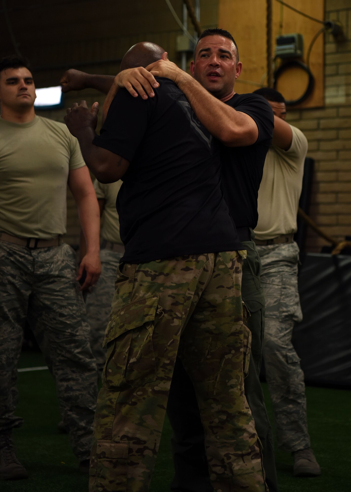 Allen Payne, Krav Maga Instructor, demonstrates a defensive maneuver during training at the Tactical Integrated Training and Nutrition Arena July 12, 2018, at Luke Air Force Base, Ariz.