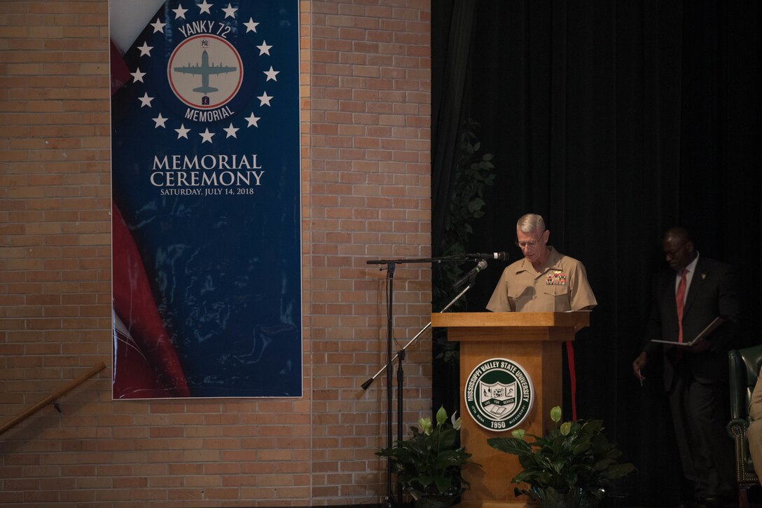 Lt. Gen. Rex C. McMillian, commander of Marine Forces Reserve and Marine Forces North, addresses the loved ones, community members and distinguished visitors who gather in the Mississippi Valley State University auditorium to honor the sacrifice of the fallen passengers and crew of Yanky 72, during the Memorial Ceremony, July 14, 2018. The Yanky 72 Memorial Ceremony was held to remember and honor the ultimate sacrifices made by the fallen Marines and Sailor of VMGR-452 and Marine Corps Special Operations Command. (U.S. Marine Corps photo by Lance Cpl. Samantha Schwoch/released)