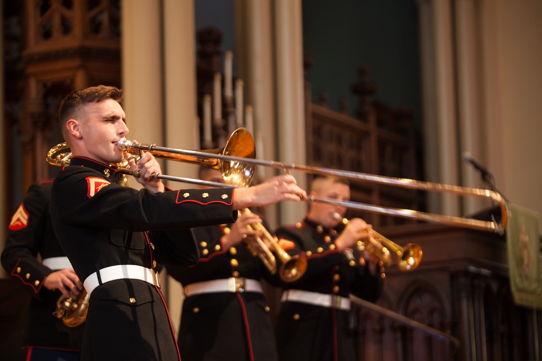 Lance Cpl. Cameron Street, trombone instrumentalist with the Marine Forces Reserve Band plays the trombone during the 20th Annual Patriotic Music Festival at the Trinity Episcopal Church, New Orleans on July 1, 2018. The music festival is one of multiple concerts performed by the band for their Independence Day concert series. (U.S. Marine Corps photo by Lance Cpl. Tessa D. Watts)