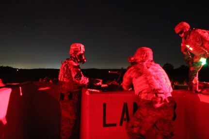 Task Force Ultimate range safety officers engage targets at night