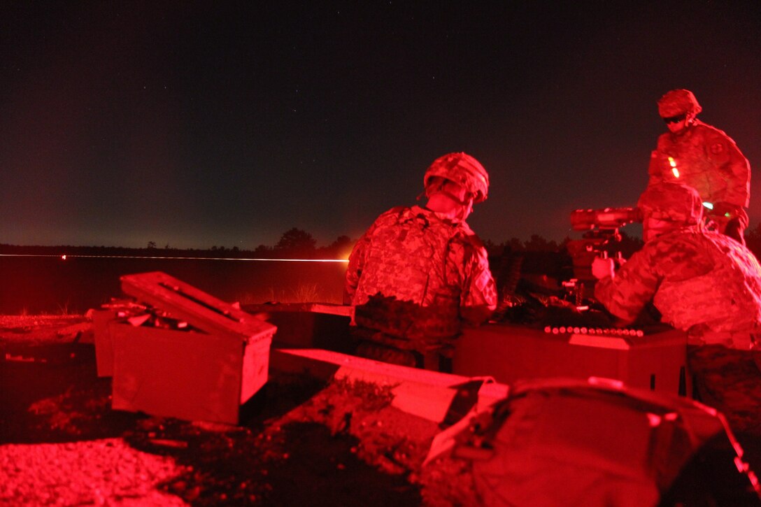 Task Force Ultimate range safety officers engage targets at night