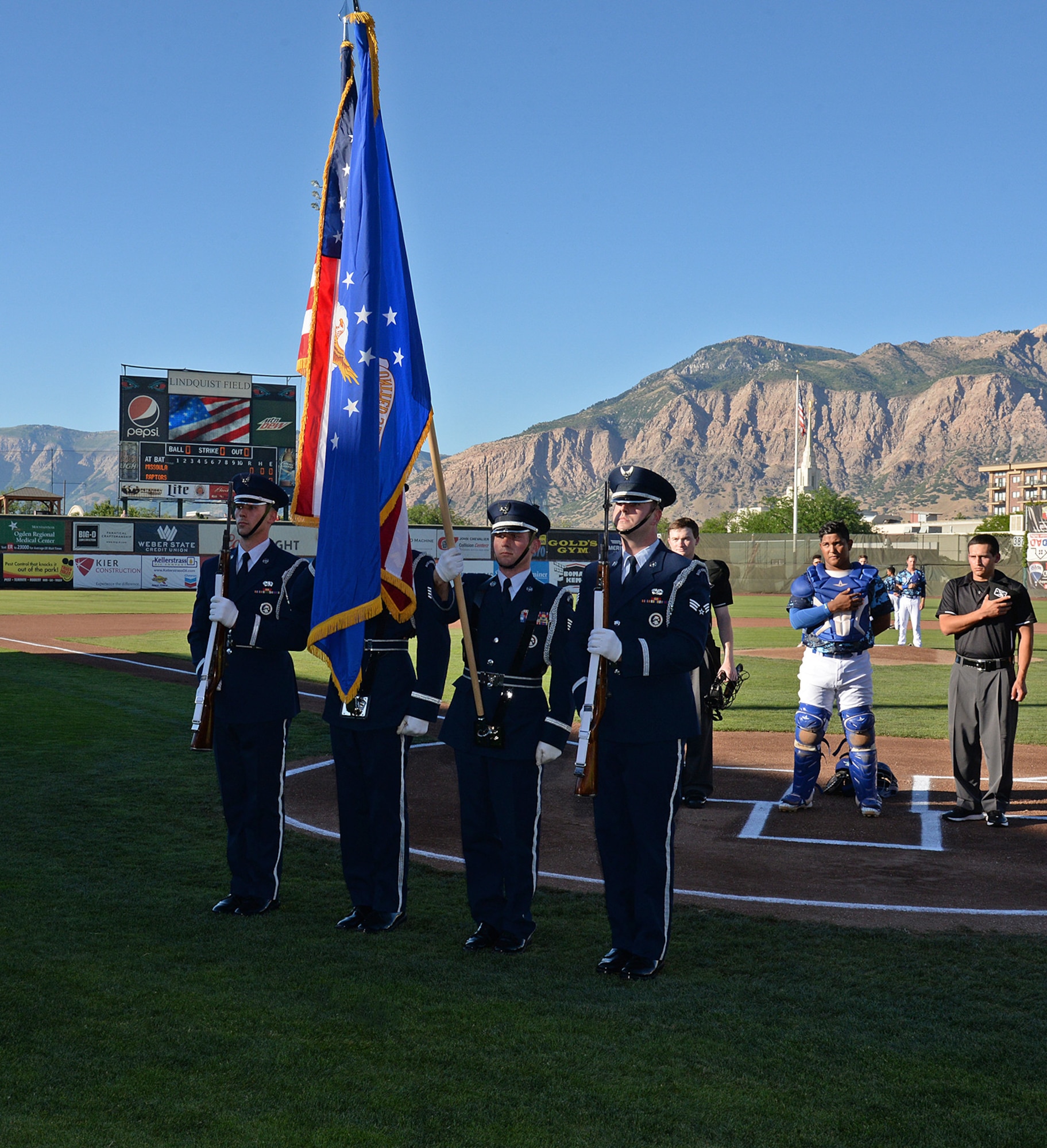 The Hill Air Force Base Honor Guard presents the colors before the July 13, 2018, Military Appreciation Night game between the Ogden Raptors and Missoula Osprey at Lindquist Field in Ogden, Utah. Each year, the Ogden Raptors team up with the Top of Utah Military Affairs Committee to offer tickets to Hill Air Force Base personnel and their families. (U.S. Air Force photo by Alex R. Lloyd)