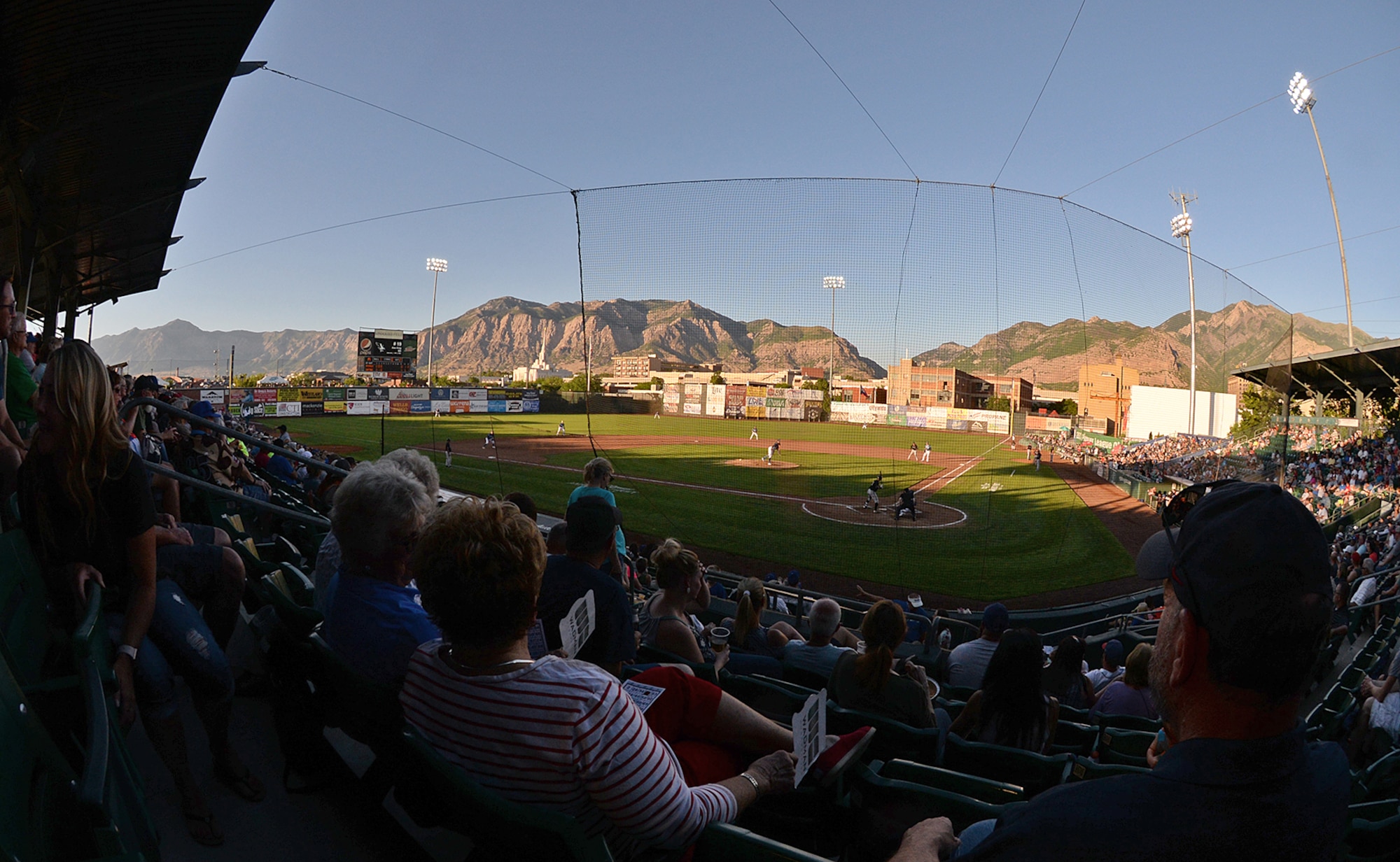 Fans watch the Ogden Raptors play the Missoula Osprey July 13, 2018, during Military Appreciation Night game at Lindquist Field in Ogden, Utah. Each year, the Ogden Raptors team up with the Top of Utah Military Affairs Committee to offer tickets to Hill Air Force Base personnel and their families. (U.S. Air Force photo by Alex R. Lloyd)
