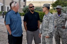 Louis Garland and Clayton Garland, decedents of late Chief Warrant Officer Louis F. Garland, meet with U.S. Air Force Ricky Mills, 17th Training Wing commander and Chief Master Sgt. Lavor Kirkpatrick, 17th TRW command chief, at the Norma Brown building on Goodfellow Air Force Base, Texas, July 13, 2018. Mills met with the Garlands before their tour of the Louis F. Garland Department of Defense Fire Academy. (U.S. Air Force photo by Senior Airman Randall Moose/Released)