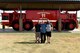 Clayton Garland, Louis Garland and Nathan Garland, decedents of late Chief Warrant Officer Louis F. Garland, pose before a P-15 Mammoth at the Department of Defense Fallen Firefighter Memorial on Goodfellow Air Force Base, Texas, July 13, 2018. The memorial houses firefighting equipment from the past and stands to honor military and DoD firefighters who died in the line of duty. (U.S. Air Force photo by Senior Airman Randall Moose/Released)