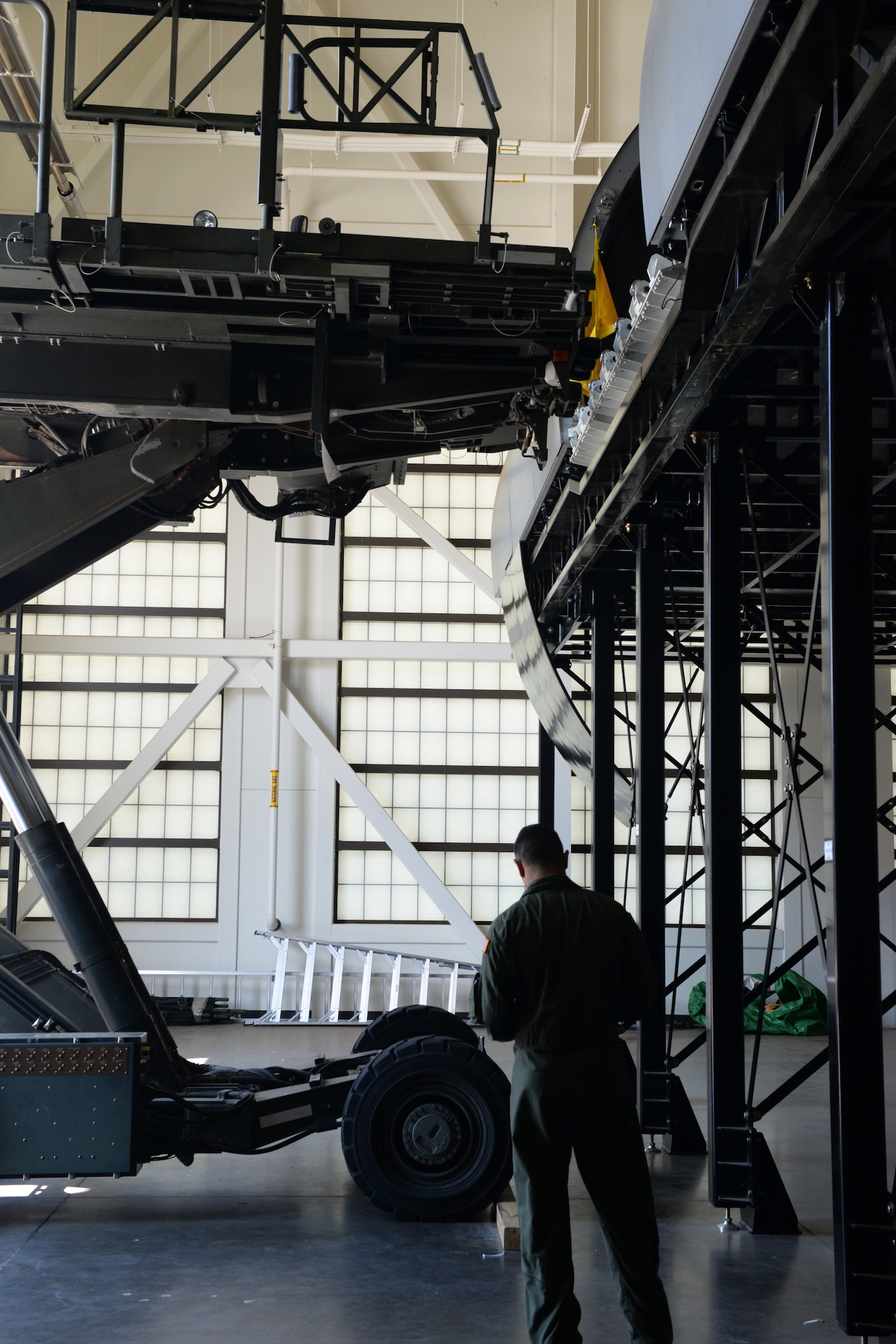 Boom operator assigned to the 56th Air Refueling Squadron stands outside the Fuselage Trainer prior to the boom operator simulated cargo training, July 10, 2018, at Altus Air Force Base, Okla.