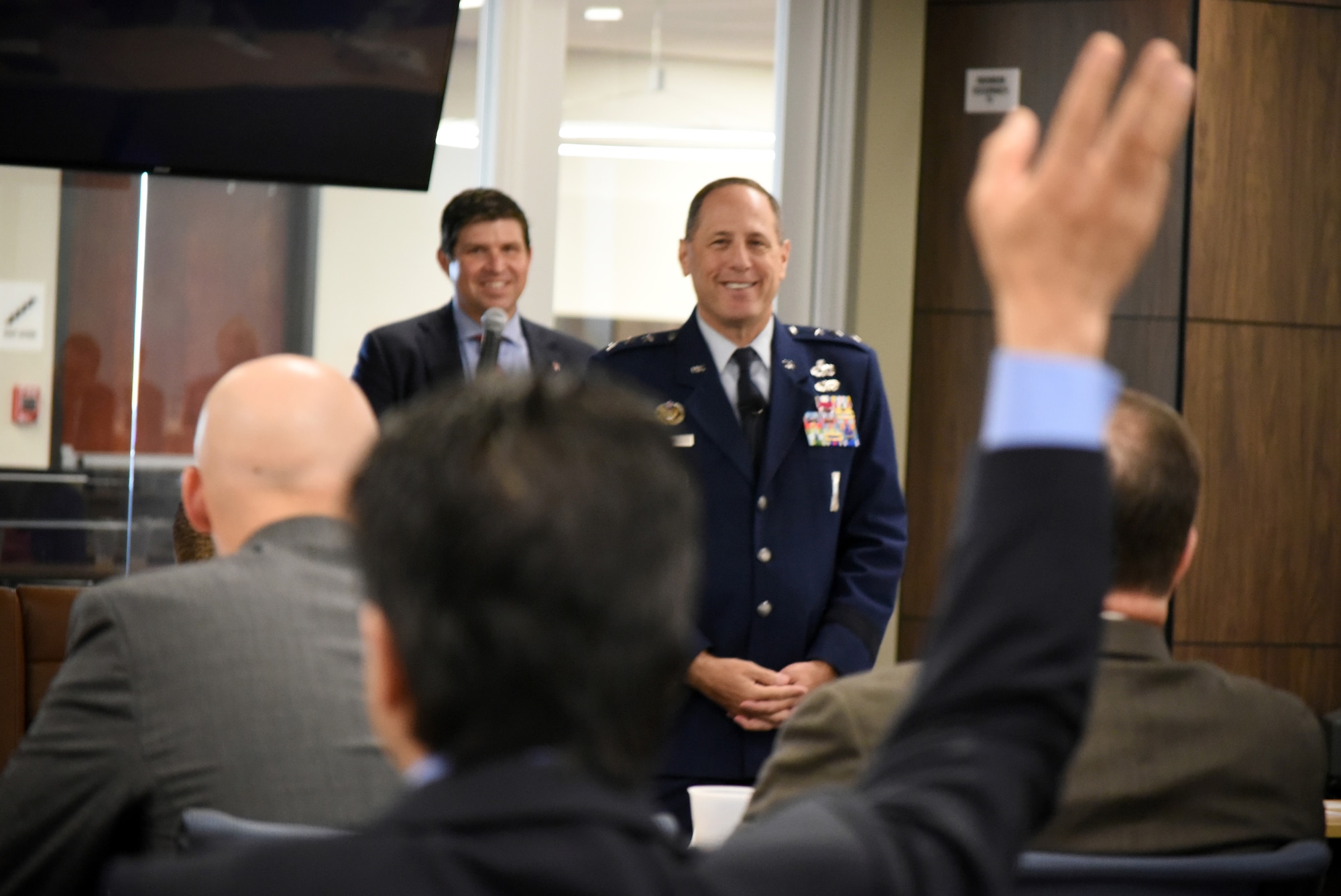 Lt. Gen. Lee K. Levy II, front, speaks at an event June 28 after being introduced by Daniel Pullin, dean of the University of Oklahoma Price College of Business. June 28. He was the inaugural speaker of a distinguished speaker series hosted at the Gene Rainbolt Graduate School of Business. His lecture centered on the theme of “Intersection of Innovation + Armed Services.”