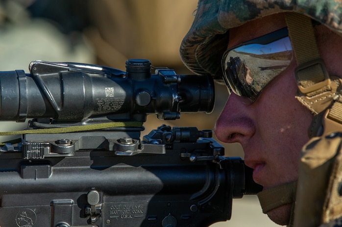 U.S. Marine Lance Cpl. Henry Young an anti-tank missleman with 1st Tanks Battalion, 1st Marine Division (MARDIV), competes during the Rifle Squad Competition on Marine Corps Base Camp Pendleton, Calif., June 27, 2018.