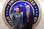 U.S. Air Force Lt. Col. Daniel McVay (left), 22nd Operations Support Squadron commander, is greeted by his father Patrick McVay, director of U.S. Strategic Command’s (USSTRATCOM) Joint Exercise, Training and Assessments Directorate, at Offutt Air Force Base, Neb., July 10, 2018. Daniel McVay attended USSTRATCOM’s Nuclear Commanders Course (NCC) from July 12 – 13, 2018. NCC is a two-day course designed to provide new nuclear enterprise commanders with a foundational understanding of USSTRATCOM’s role in building and maintaining the nuclear war plan, nuclear command and control capabilities, and their unit’s role in the strategic deterrence mission. USSTRATCOM has global responsibilities assigned through the Unified Command Plan that include strategic deterrence, nuclear operations, space operations, joint electromagnetic spectrum operations, global strike, missile defense, and analysis and targeting.