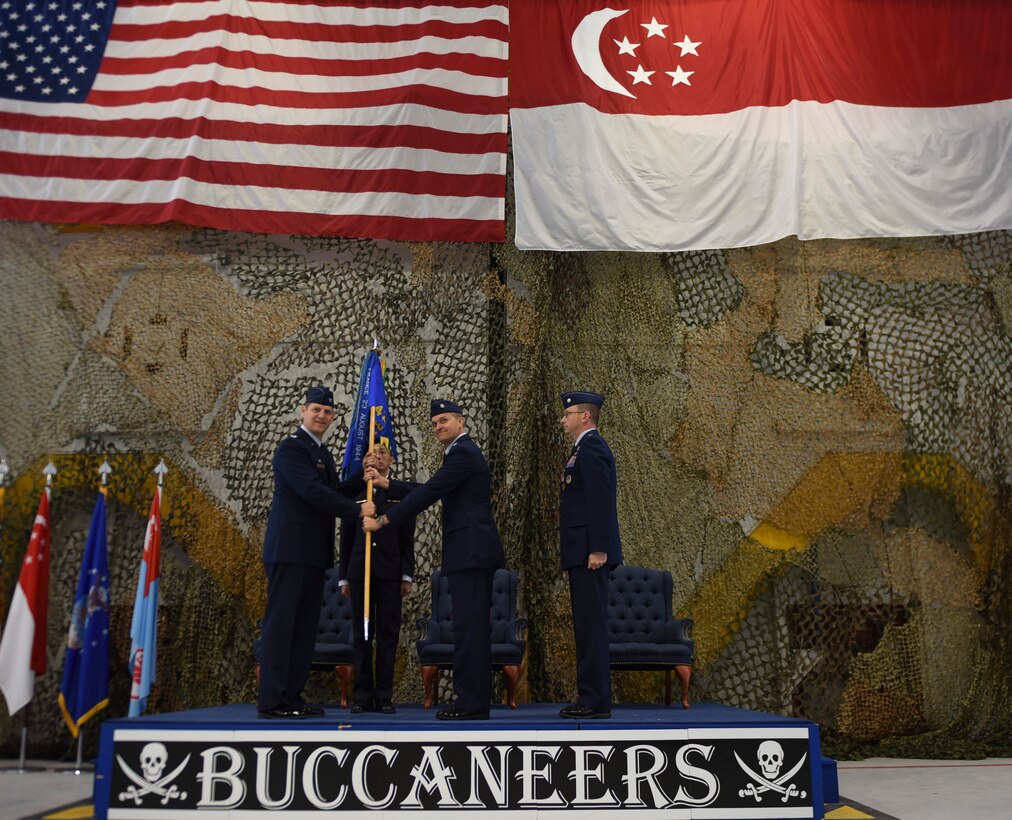 Image of Col. Joe Kunkel, 366th Fighter Wing commander, passes the 428th Fighter Squadron to Lt. Col. Andrew Gilbert, 428th Fighter Squadron commander, June 29, 2018, at Mountain Home Air Force Base Idaho. Before this assignment Gilbert served in the 607th Air Operations Center at Osan Air Base, Republic of Korea. (U.S. Air Force photo by Senior Airman Alaysia Berry)