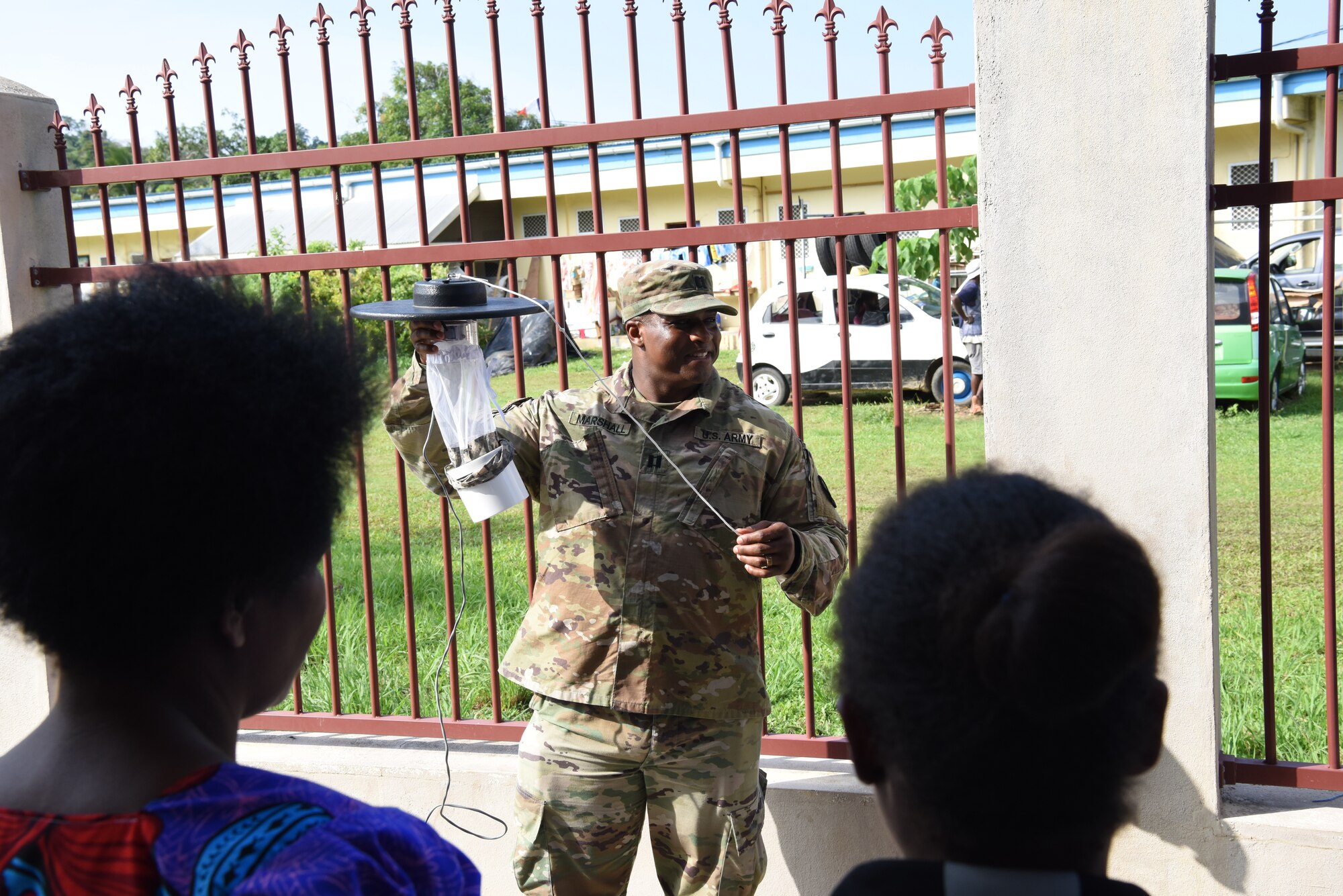 U.S. Army Capt. Keith Marshall Jr., U.S. Army Public Health Command Pacific entomologist, Joint Base Lewis-McChord, Wash., discusses types of traps used to catch mosquitoes tested for vector-borne diseases during a subject matter exchange as part of Pacific Angel (PAC ANGEL) 18-3 in Luganville, Vanuatu, July 10, 2018.