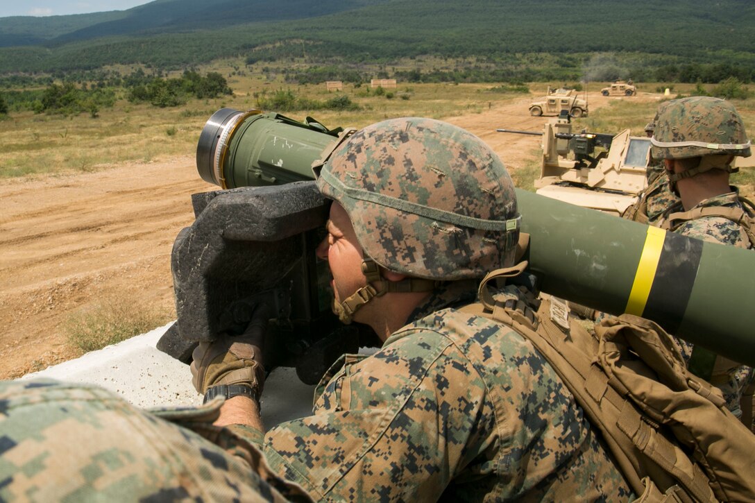 A U.S. Marine with Black Sea Rotational Force 18.1 locks onto a target using an FGM-148 Javelin anti-tank missile launcher during a deployment for training exercise at Novo Selo Training Area, Bulgaria, July 5, 2018