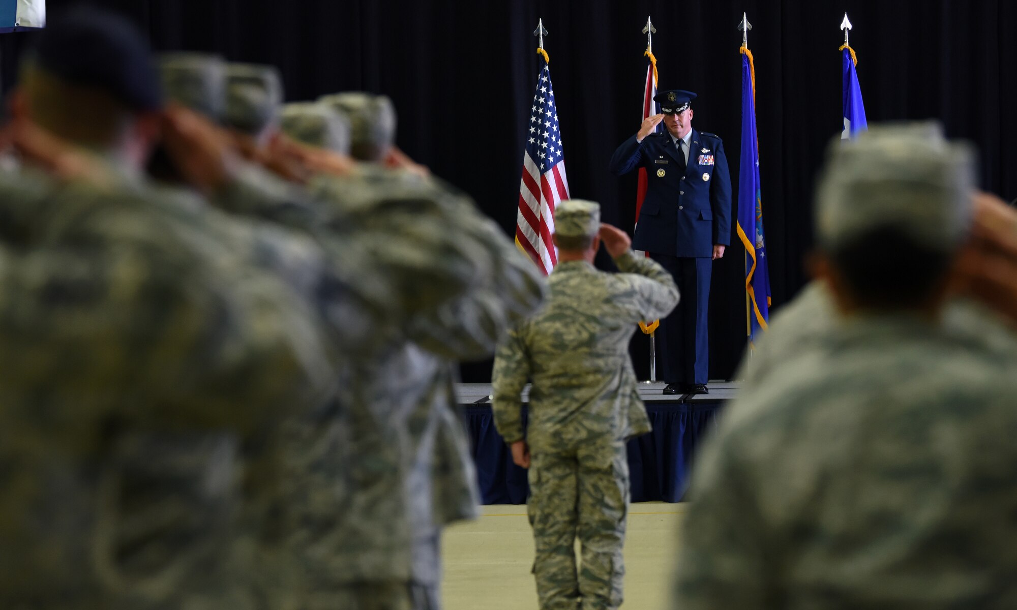 Col. William Marshall receives his first salute as the 48th Fighter Wing commander during a change of command ceremony at Royal Air Force Lakenheath, England, July 16, 2018. Prior to his assignment to the Liberty Wing, Marshall was the Commander of the 332nd Expeditionary Operations Group. (U.S. Air Force photo by Staff Sgt. Alex Fox Echols III)
