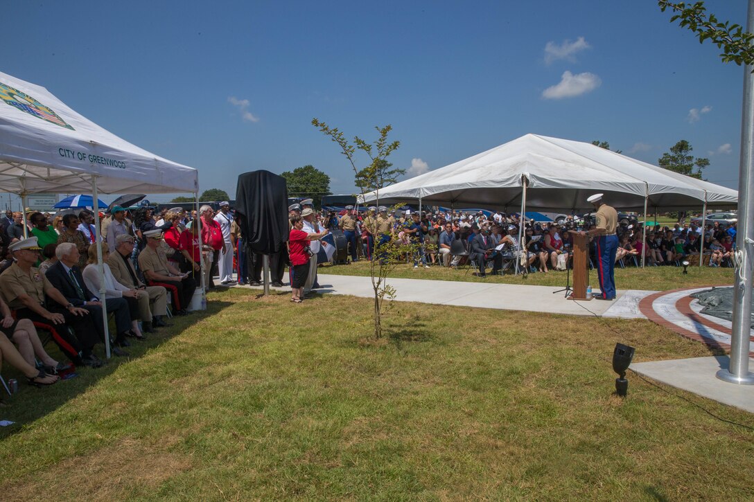 Sgt. Maj. Ronald L. Green, 18th sergeant major of the Marine Corps, addresses the loved ones, community members and distinguished visitors, who gather at the Memorial Marker dedicated to honor the sacrifice of the fallen passengers and crew of Yanky 72, during the Memorial Ceremony, July 14, 2018. The Yanky 72 Memorial Ceremony was held to remember and honor the ultimate sacrifices made by the fallen Marines and Sailor of VMGR-452 and Marine Corps Special Operations Command. (U.S. Marine Corps photo by Lance Cpl. Samantha Schwoch/released)