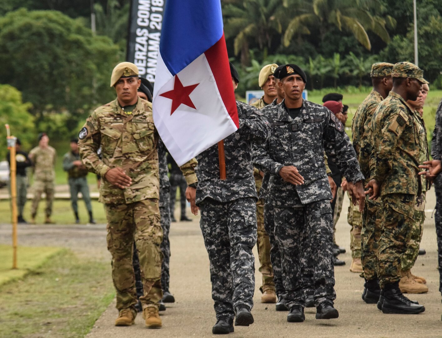 Panamanian Comandos return to their place after passing the torch during the opening ceremony for Fuerzas Comando