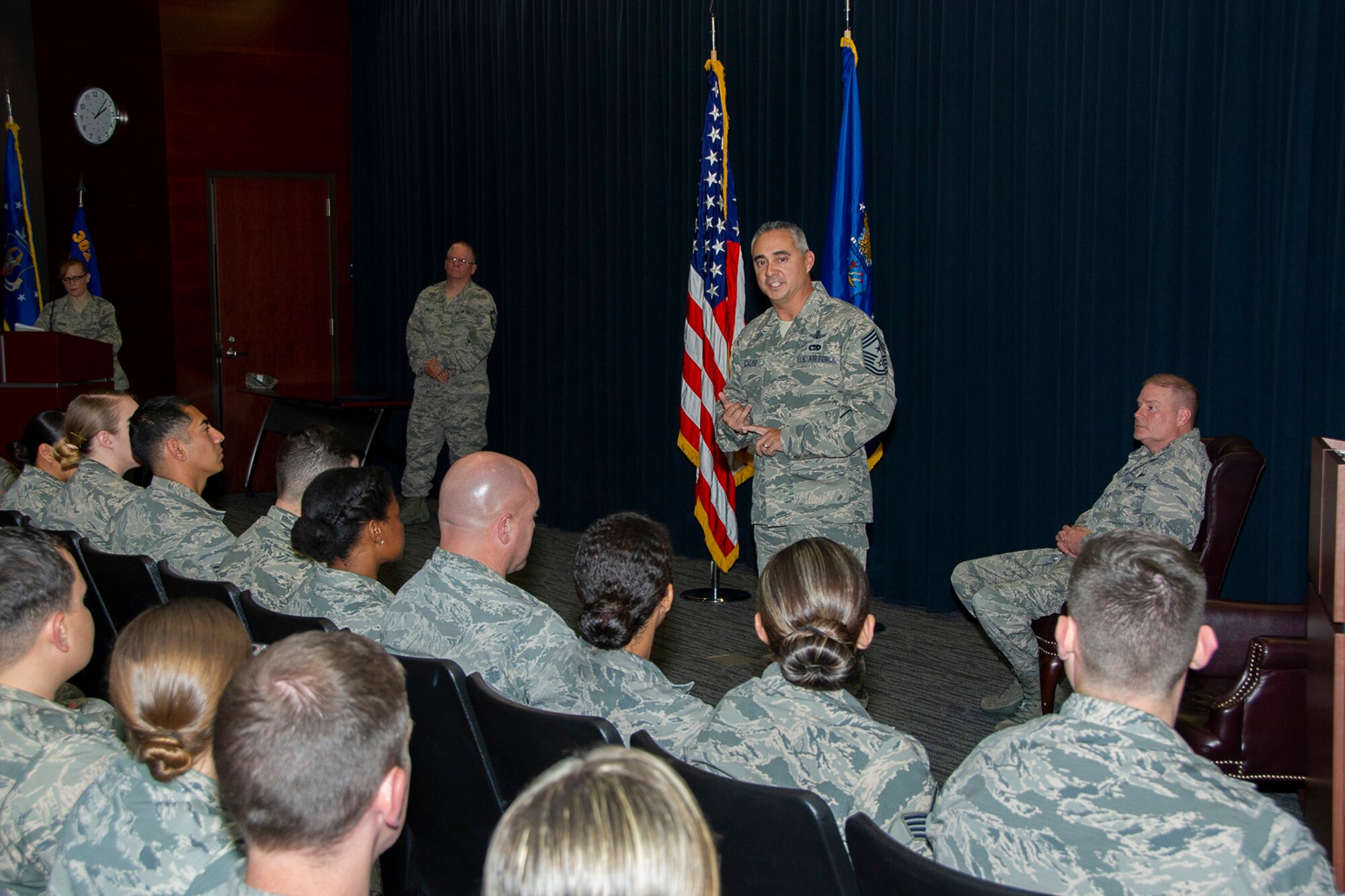 Chief Master Sgt. Kahn Scalise, 302nd Airlift Wing command chief, speaks to graduates of the Air Force Reserve Command’s Noncommissioned Officer Leadership Development Course during their graduation ceremony, July 13, 2018, at Peterson Air Force Base, Colorado.