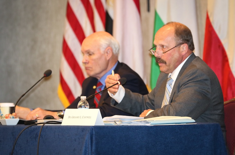 (From right to left) Dr. Gregory L. Cantwell, director, U.S. Army War College, discusses the structure of a coalition alongside, Dr. John A. Bonin, professor, U.S. Army War College, at the 2018 Senior Strategy Session – Arabian Peninsula / Levant in Arlington, Va, July 10, 2018. Cantwell, who heads the Combined/Joint Force Land Component Command (CJFLCC) Course at the Center for Strategic Leadership, and Bonin explained the key differences between alliances and ad hoc coalitions as well as the importance of collaboration and interoperability for both. Over the four-day conference, speakers and participants will engage in discussions centering on the complexities and lessons learned from Joint, Interagency, Intergovernmental and Multinational (JIIM) efforts during ongoing theater campaigns that have global implications.