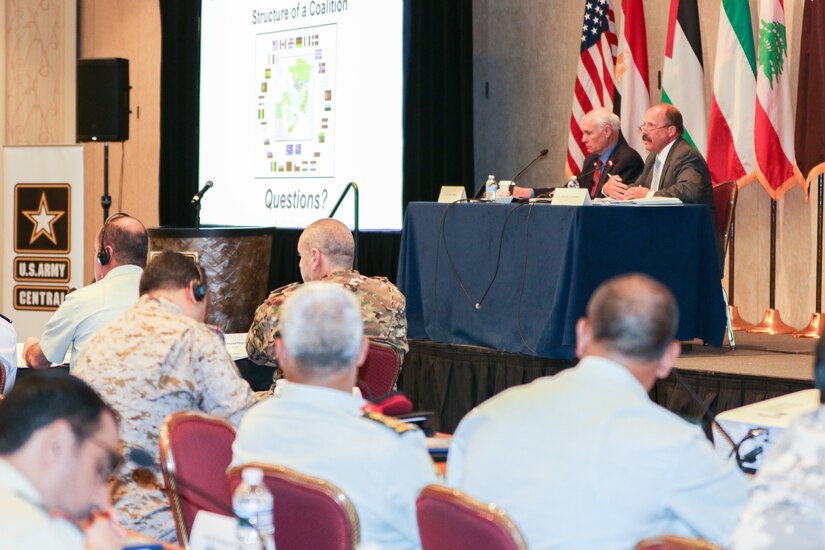 Dr. John A. Bonin, professor, and Dr. Gregory L. Cantwell, director of the Center for Strategic Leadership, U.S. Army War College, take questions after their presentation on “The Structure of a Coalition” at the 2018 Senior Strategy Session – Arabian Peninsula / Levant in Arlington, Va, July 10, 2018. The conference promoted the successes of ongoing coalition action against emerging threats and improved shared understanding of regional land force counterparts to invest in the right capabilities to achieve better interoperability and greater effectiveness in pursuing mutual national interests. Over the four-day conference, speakers and participants will engage in discussions centering on the complexities and lessons learned from Joint, Interagency, Intergovernmental and Multinational (JIIM) efforts during ongoing theater campaigns that have global implications.