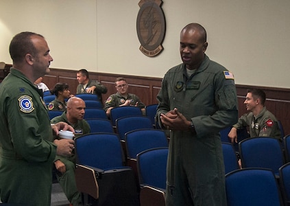 Participants gather inside the Danielson auditorium for day two of the AETC PRA training enhancement summit, Joint Base San Antonio-Randolph, Texas, July 11, 2018. This is a 3-day summit hosted by AETC, led by four different program managers representing graduate and undergraduate RPA training systems and training programs.