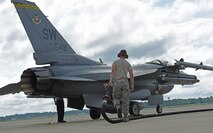 U.S. Air Force Senior Airman Ryan Cassidy, 20th Aircraft Maintenance Squadron (AMXS) tactical aircraft maintainer, sets up the refueling pump for his fellow Airmen at Shaw Air Force Base, S.C., June 26, 2018.